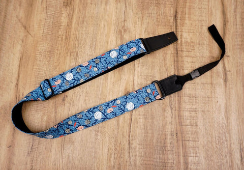 shell on light blue ukulele shoulder strap with leather ends-3