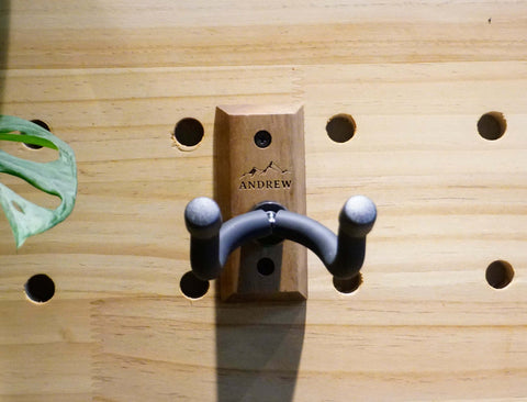 Guitar hanger wall mount