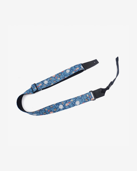 shell on light blue ukulele shoulder strap with leather ends-1